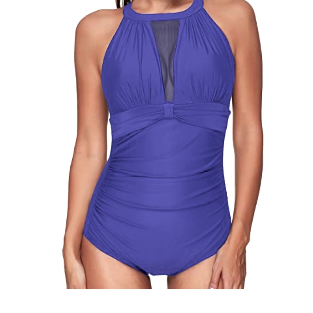 Purple one piece swimsuit, with rouche stomach area & adjustable neck ties.